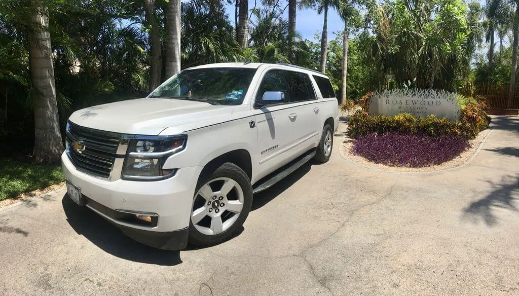 Silver Luxury SUV parked at Rosewood Mayakoba